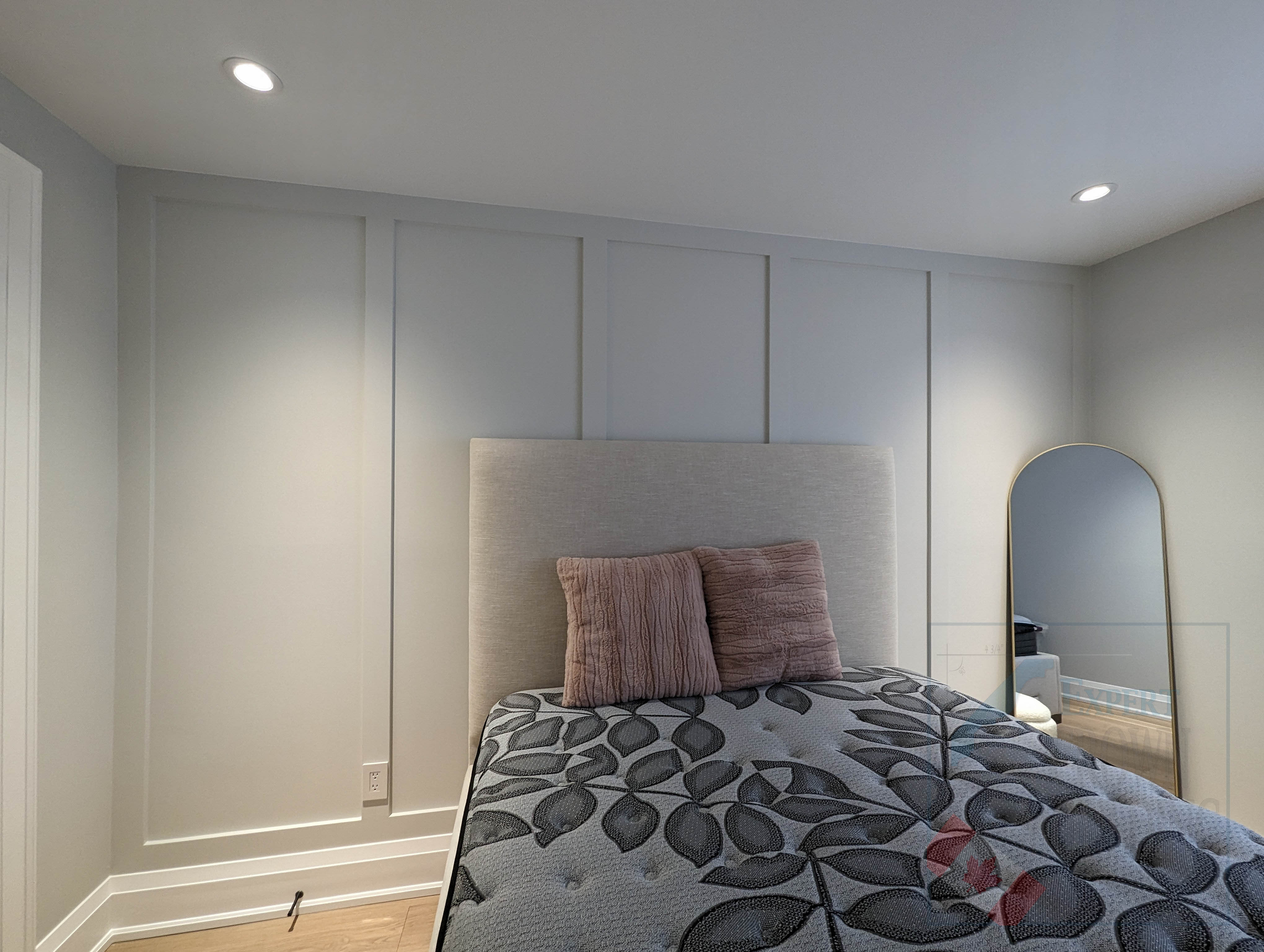 Full-height board and batten bedroom feature wall