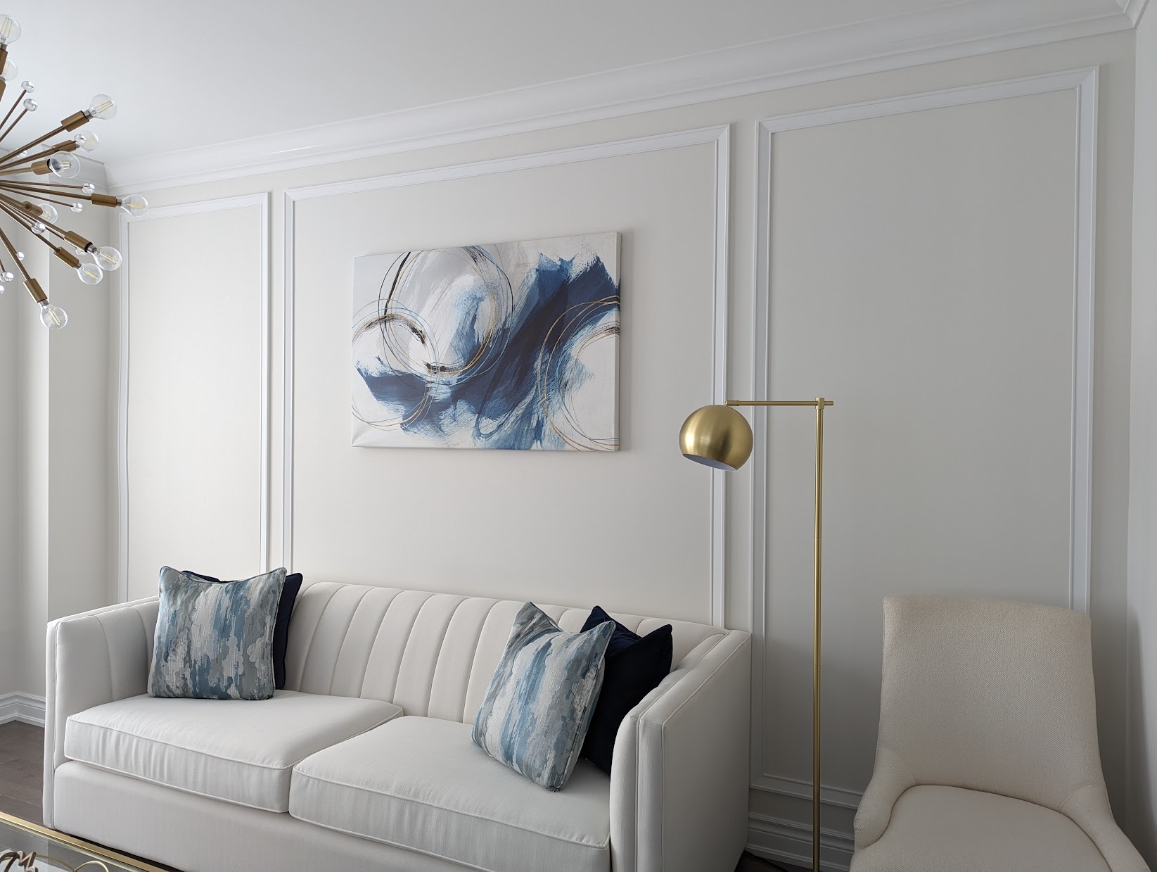 Traditional living room with panel moulding picture frame wall