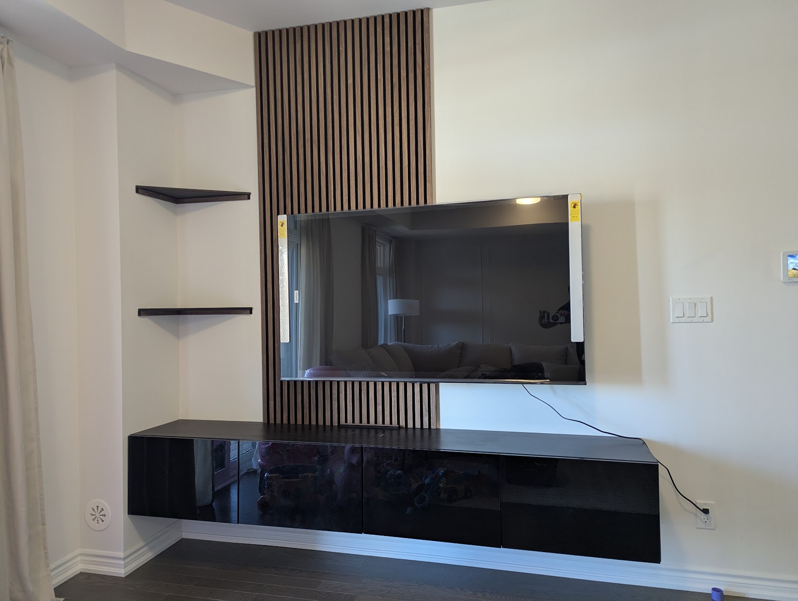 Slat wall behind TV living room