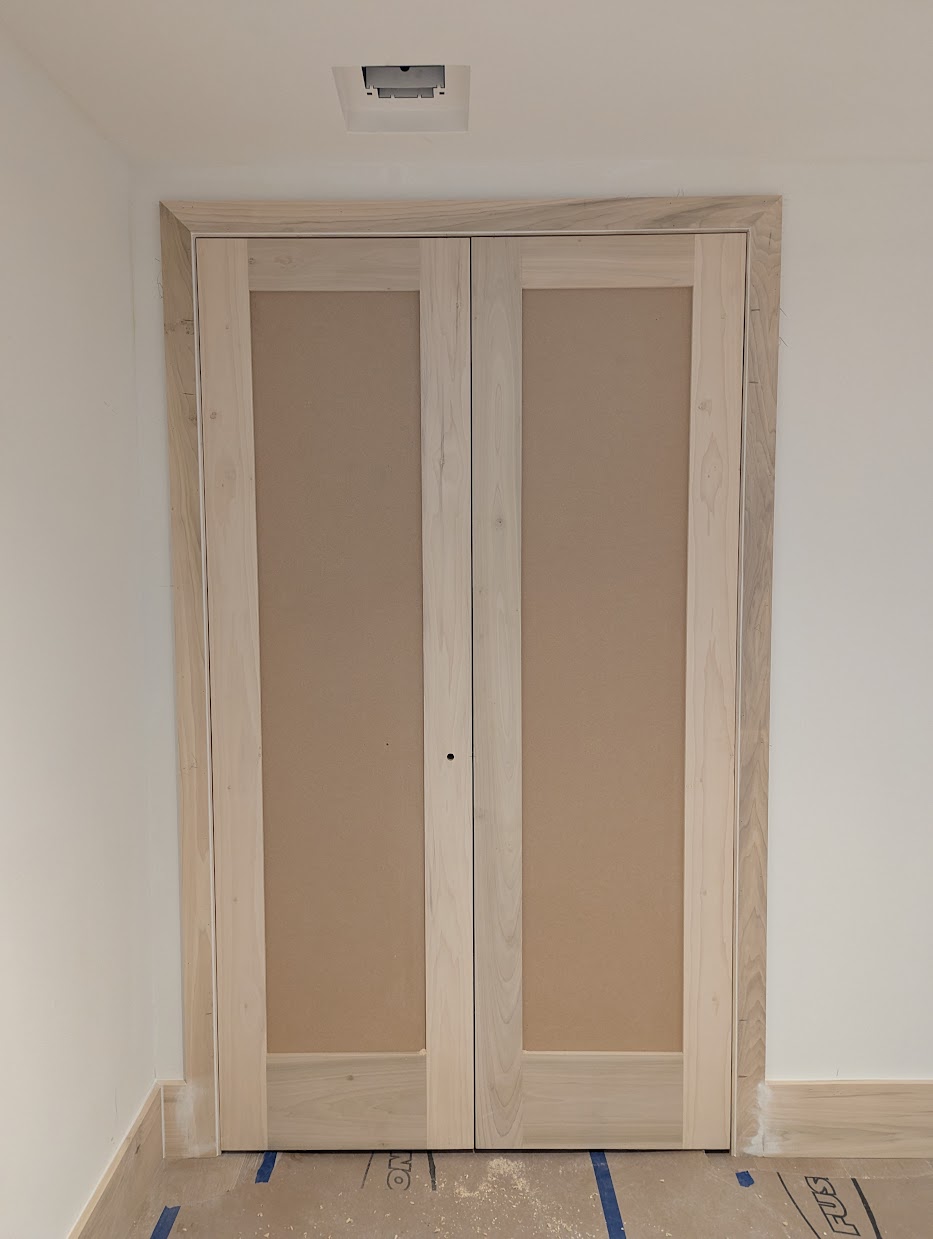 Finished flush door install with invisible Tectus hinges, Toronto home