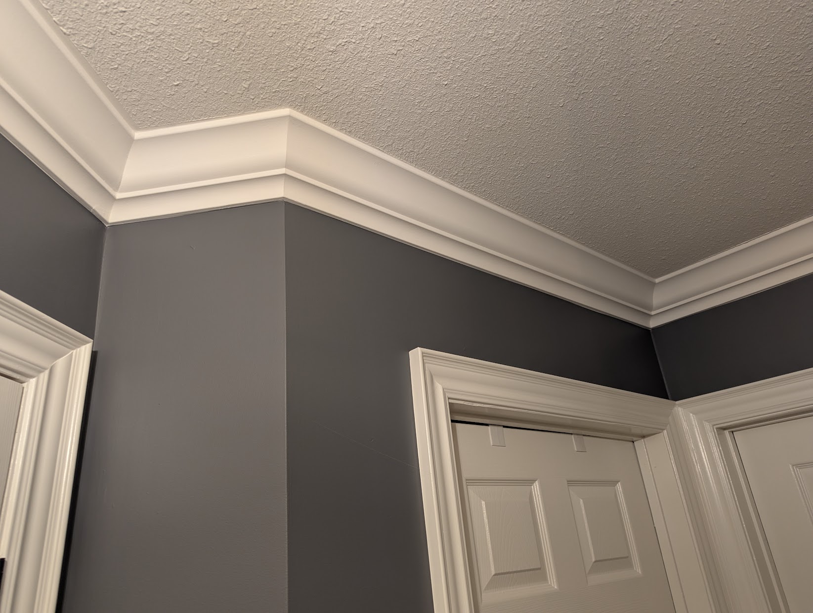Finished crown moulding install in a Vaughan dining room