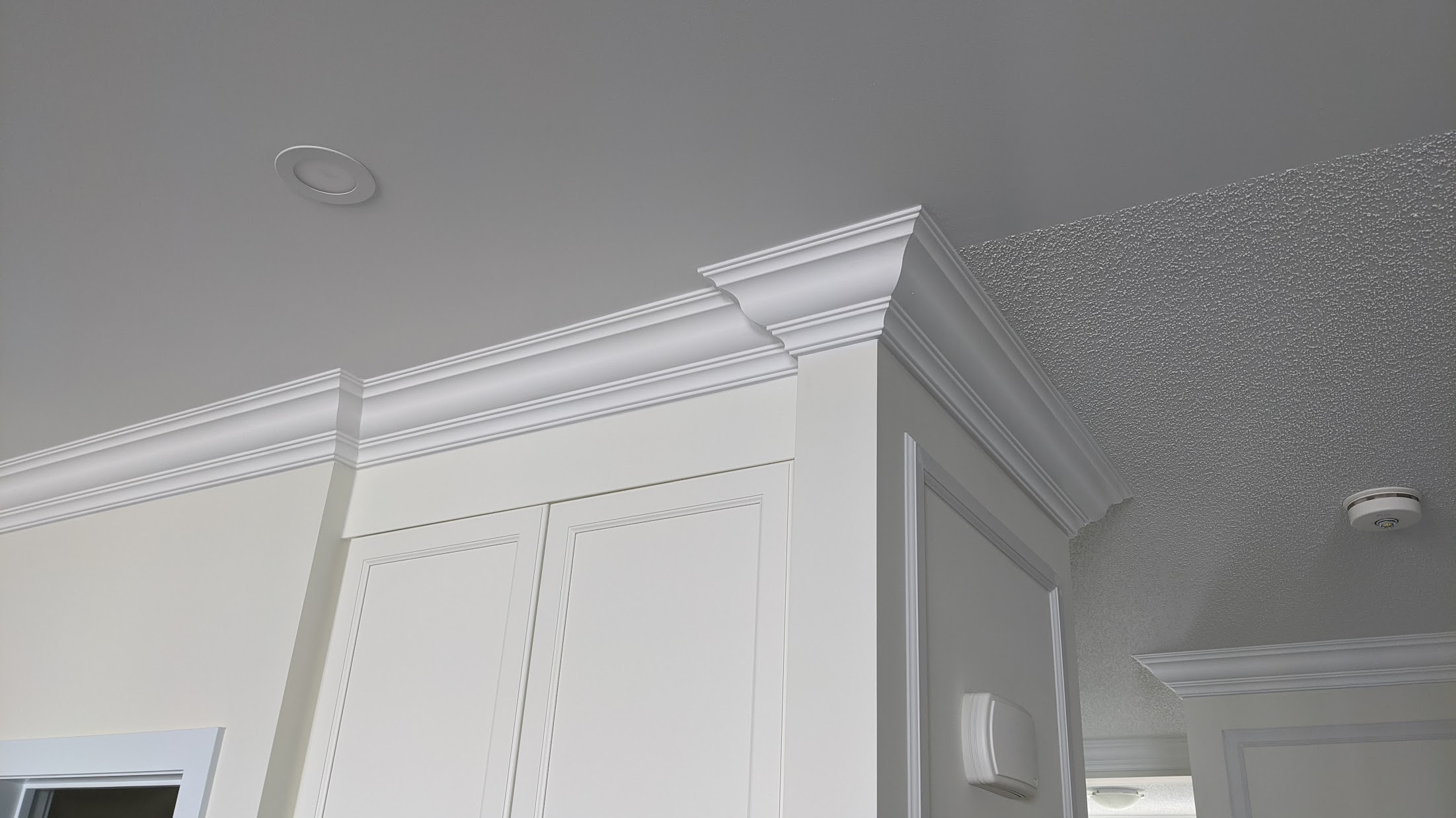 Crown moulding installation in progress