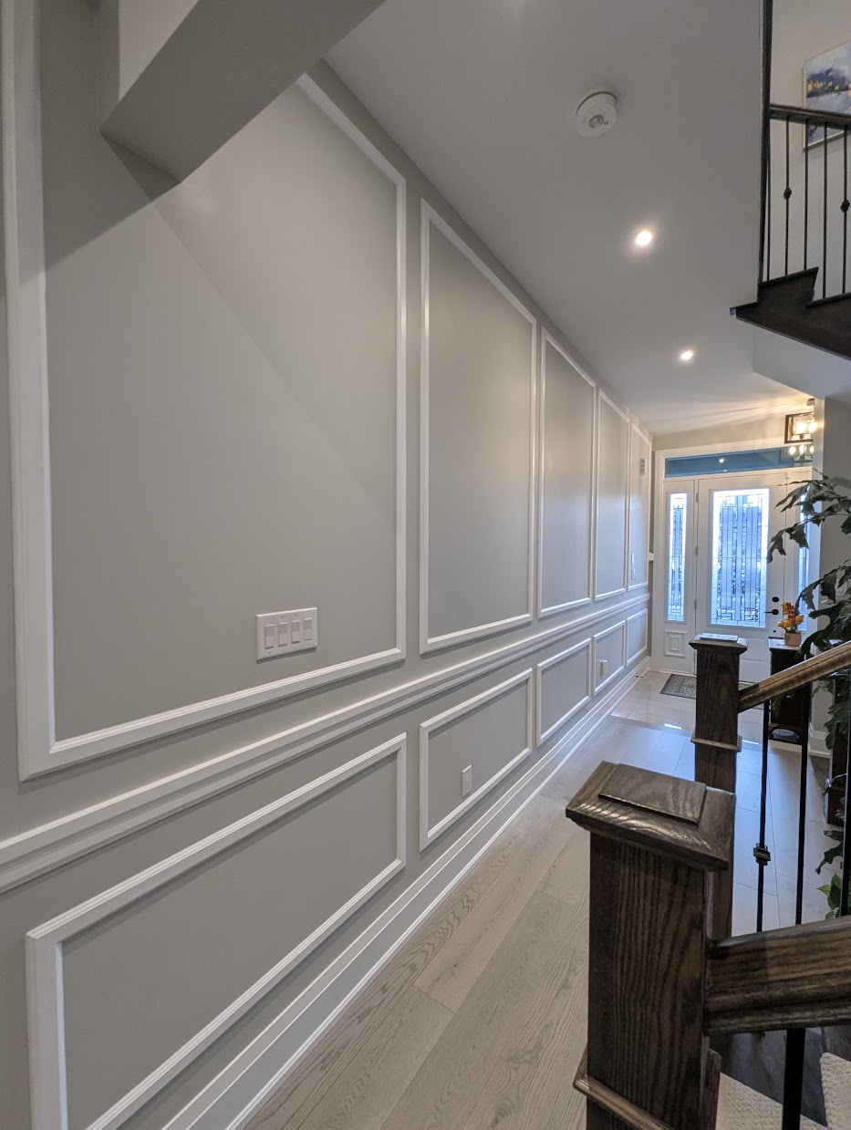 Picture-frame wainscoting hallway install in a Markham home