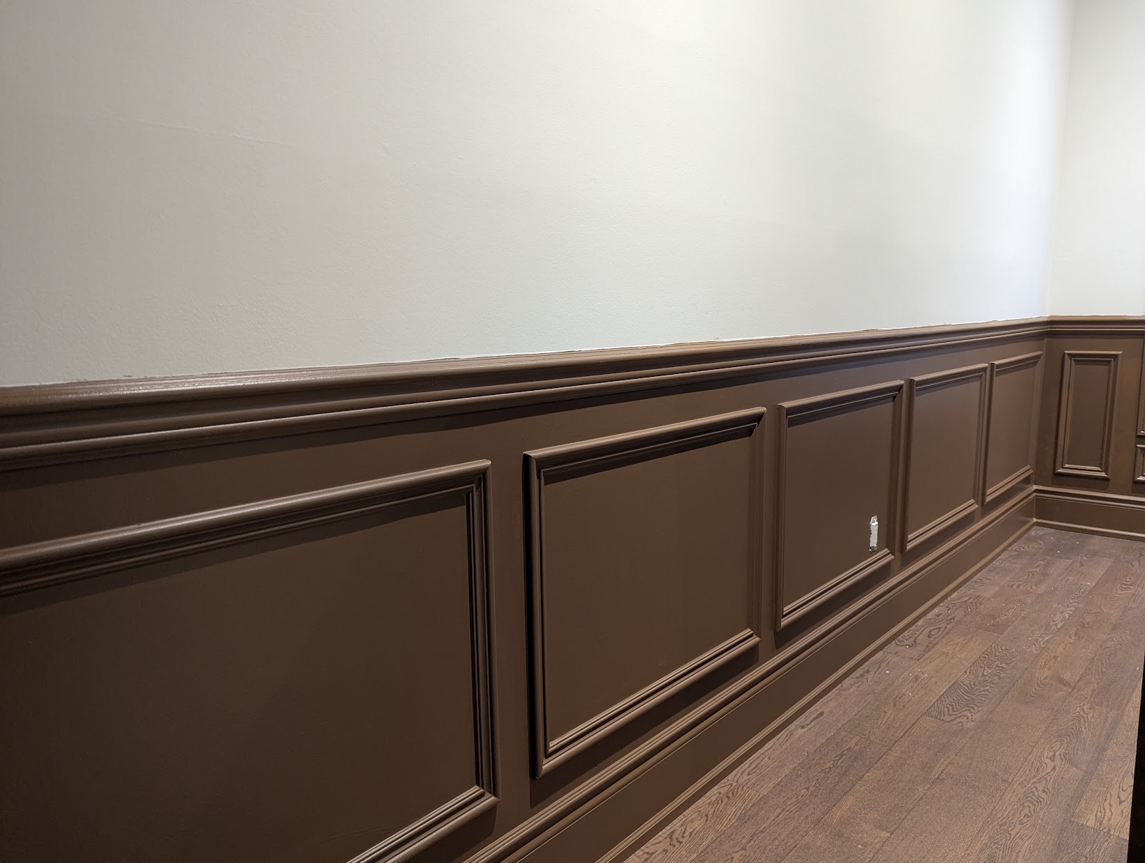 Picture-frame wainscoting in a GTA living room