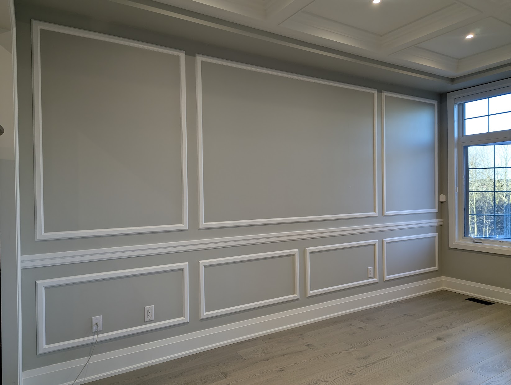 Flat panel Shaker-style wainscoting in a Markham home