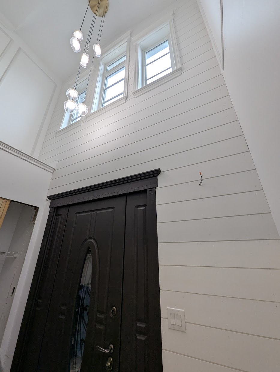 Shiplap wainscoting installation in a Toronto home