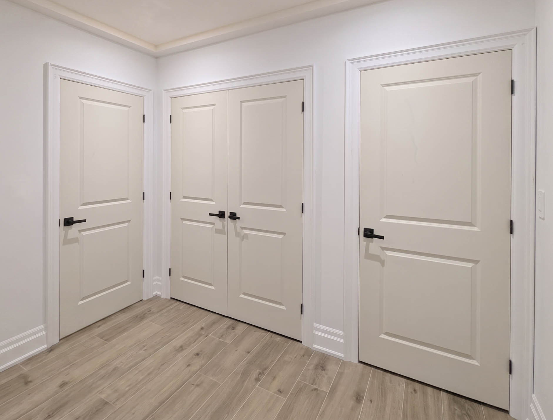 Interior door installation in a Markham home &mdash; modern flush door with concealed hinges