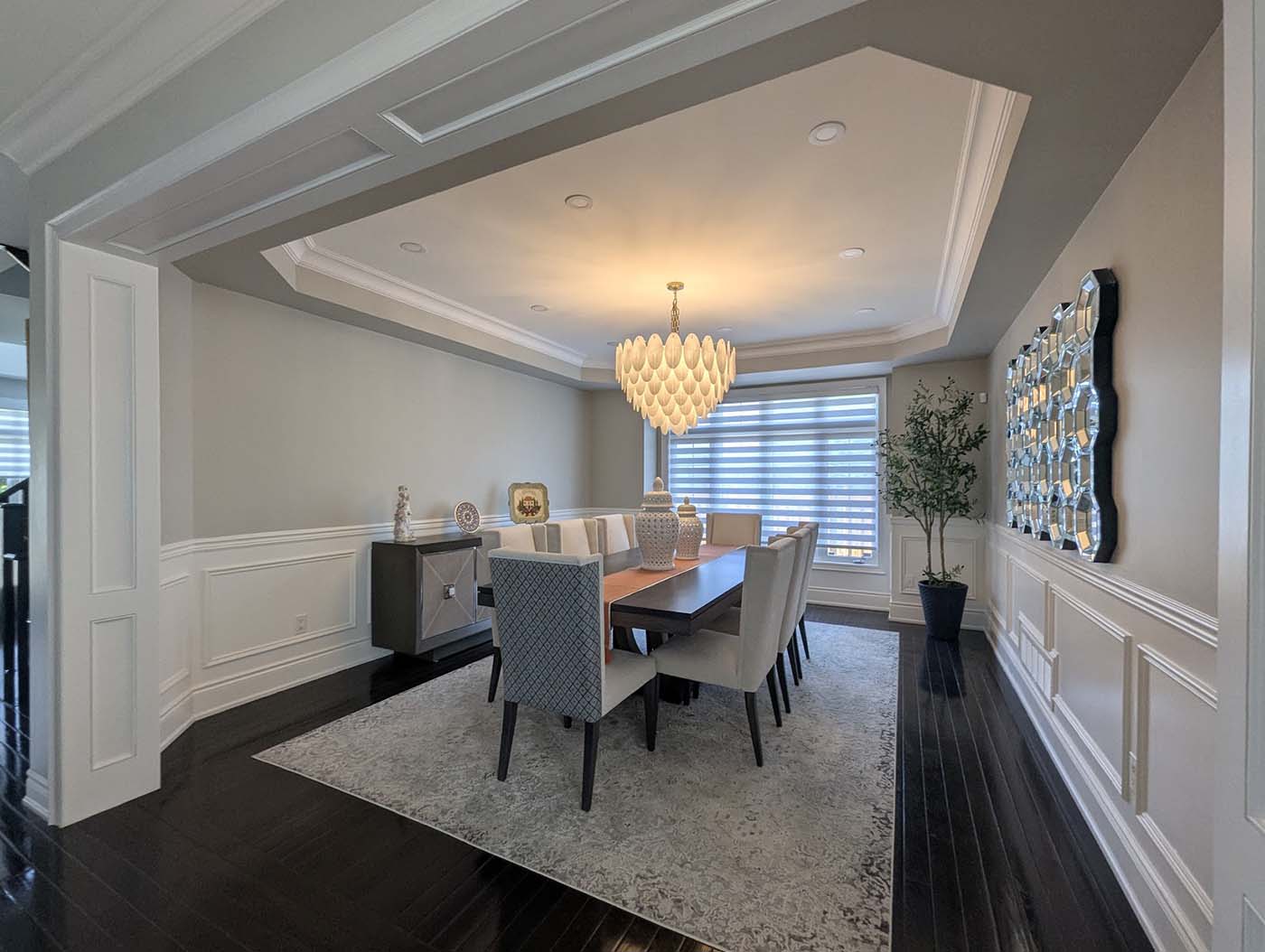 Raised-panel wainscoting in dining room — architectural finish work Toronto