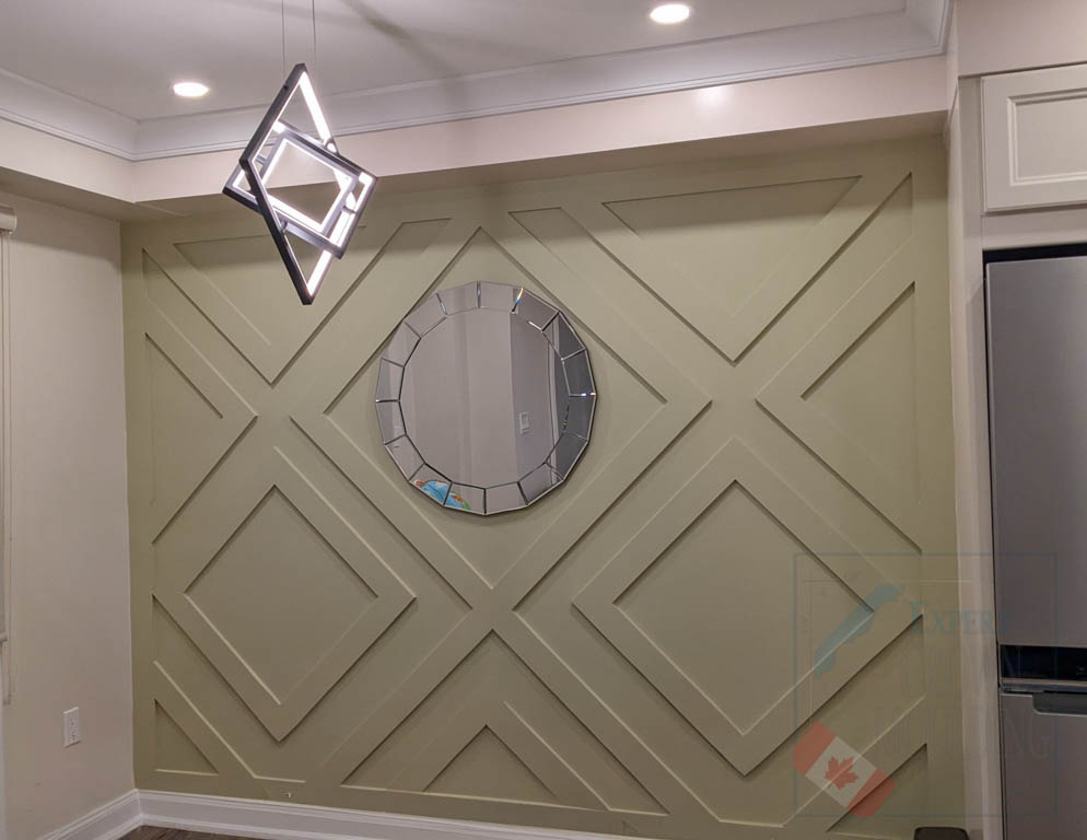 Unique geometric pattern feature wall in dining room Richmond Hill
