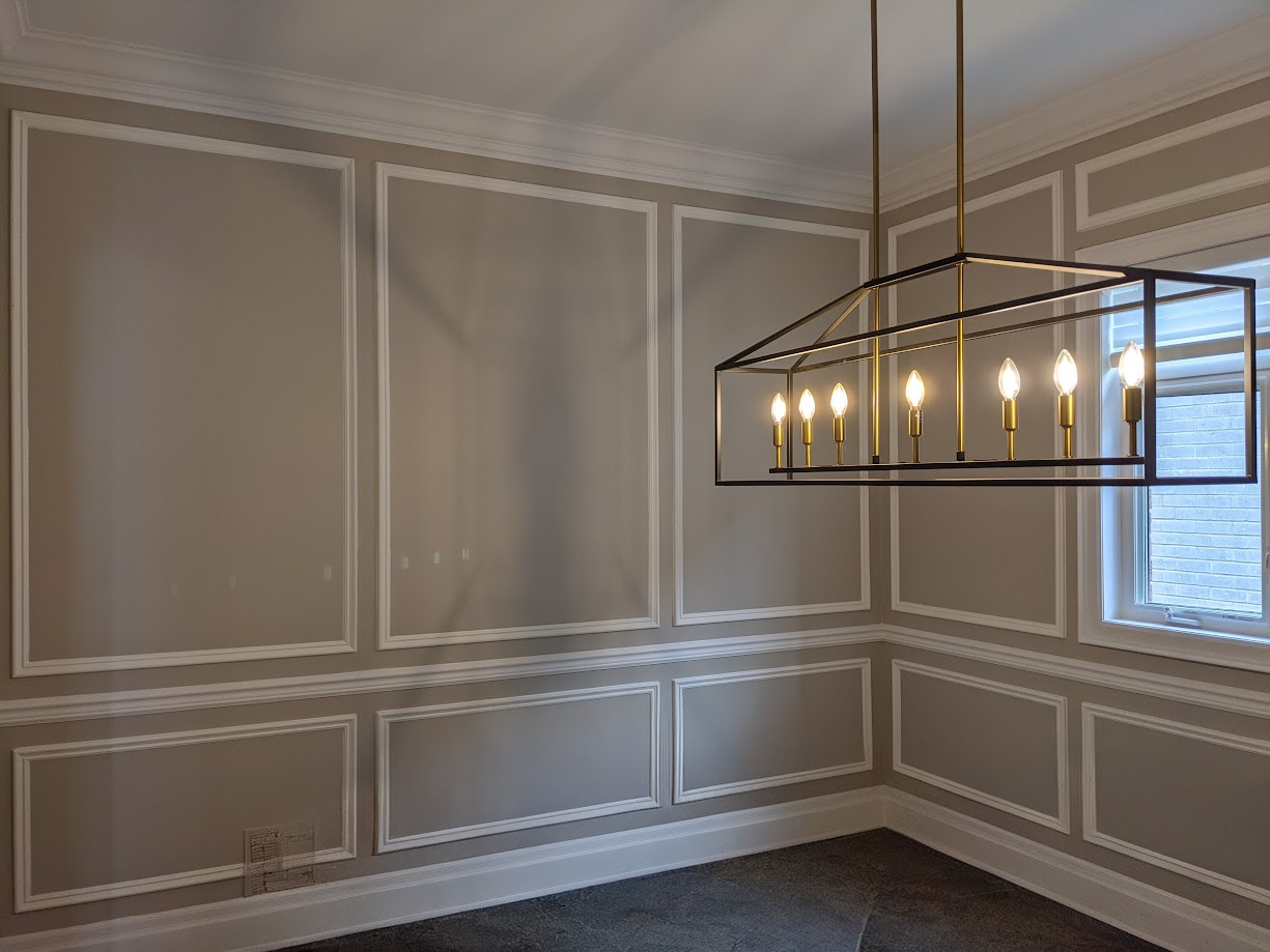 Full wall paneling chair rail style wainscoting